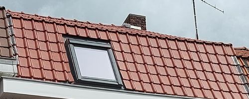 Vu d'une toiture en tuile rouge rénové sur Nieppe