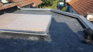Toiture plate renové sur comine